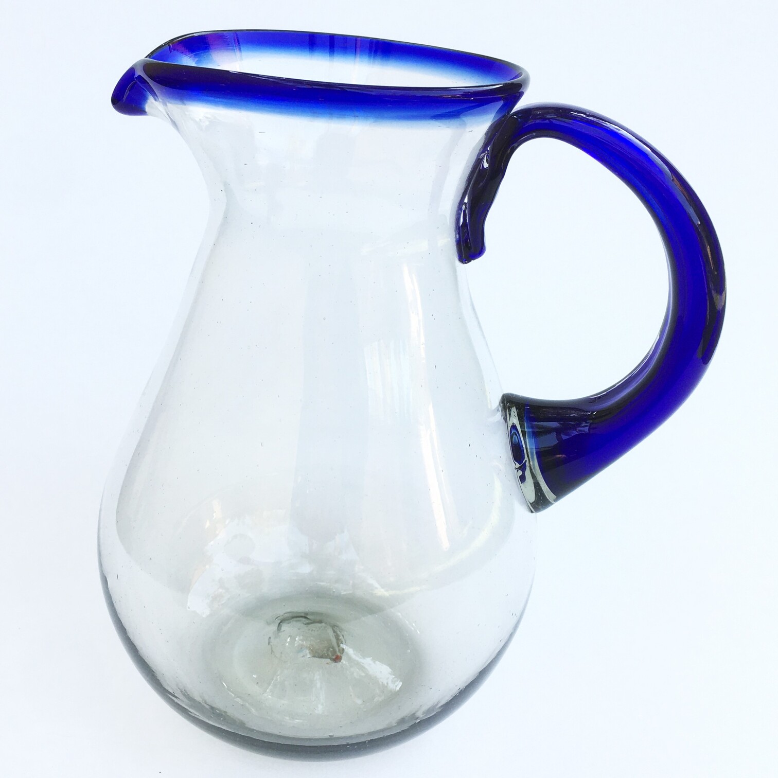 MEXICAN GLASSWARE / Cobalt Blue Rim Tall Pear Pitcher / This classic pitcher is perfect for pouring out all kinds of refreshing drinks.